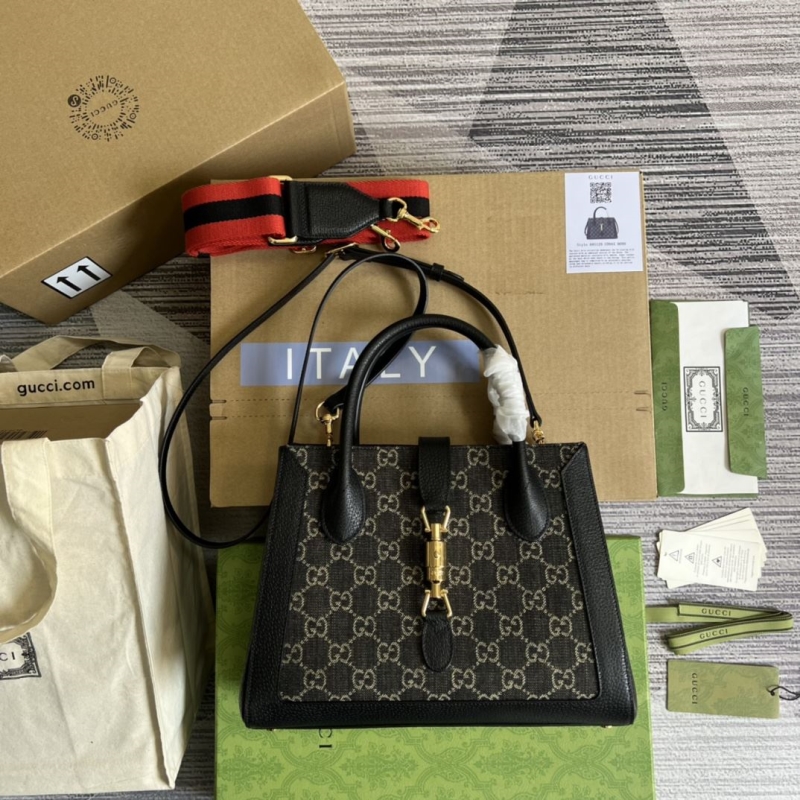 G*u*i top handle bags